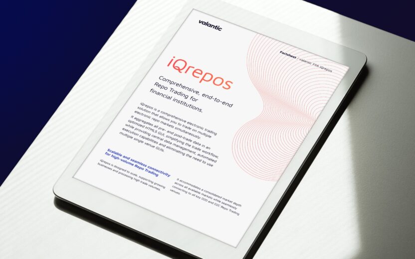 White tablet showing the title page of the factsheet for the valantic FSA Repo Trading product iQrepos, positioned on a white table with natural light and shadow.