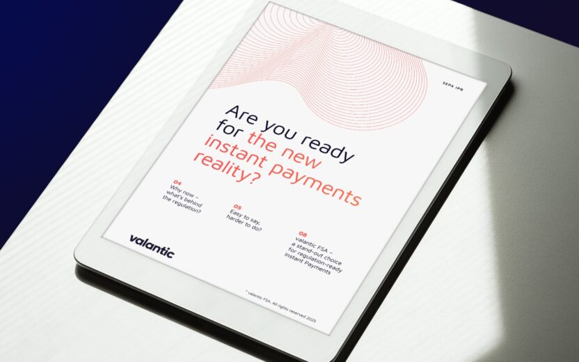 White tablet showing the title page of the Trend Report "Are you ready for the new instant payments reality", positioned on a white table with natural light and shadow.
