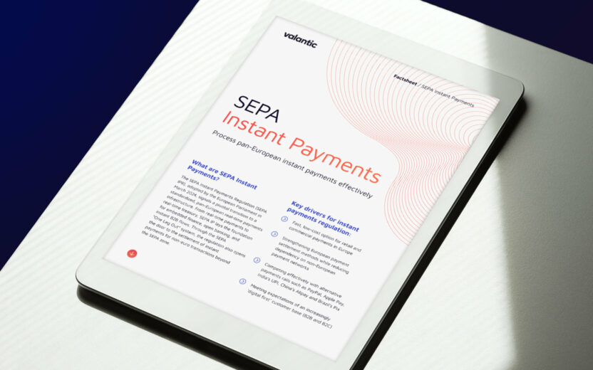 White tablet showing the title page of the SEPA Instant Payments factsheet, positioned on a white table with natural light and shadow